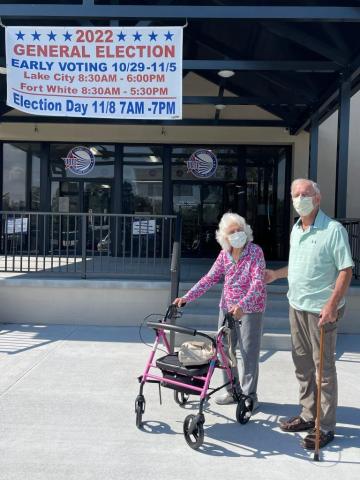 Helena Powers (left), a 106-year-old voter, makes time to cast her ballot alongside her son, Frank Powers (82). (COURTESY)