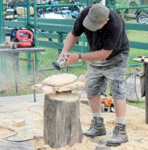 A chain saw artist works at a previous Old Tyme Farm Days event at the Spirit of the Suwannee Music Park. (COURTESY)