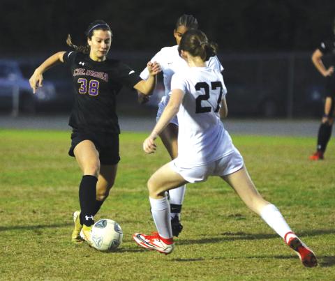 Columbia’s Skyler Ziegaus pushes the ball up the field against Leon last season. (FILE)