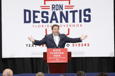 Gov. Ron DeSantis gestures as he addresses 1,200 supporters during a ‘Keep Florida Free Pit Stop’ at Florida Gateway College’s Howard Center on Thursday. (JAMIE WACHTER/Lake City Reporter)