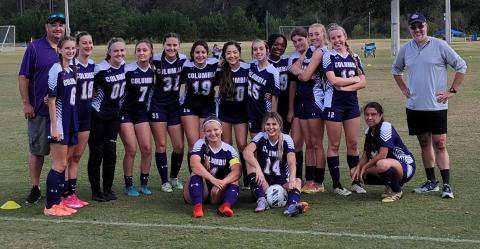 Columbia's girls soccer team: head coach Chip Garner (from left), Audrey Fender, Skyler Ziegaus, Haley Schraeder, Penelope Wheeldon, Sydney Rivas, Sally Sparks, Ashley Caballero, Caitlyn Tolley, Olivia Kelly, Sadie Sparks, Kyndall Norris, Lilly Schneider, Carla Medina-Rodriguez and Coach Raul Medina-Muniz. In front are Krystin Hughes and Mia Brasel. (COURTESY)