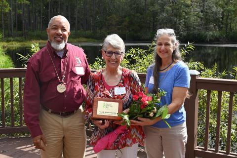 Fort White High School’s Irene ‘Trini’ Johannesen was named the Florida Project Learning Tree Educator of the Year. She received her award from Robert Raze, the steering committee chair, and Elise Cassie, interim coordinator. (COURTESY)