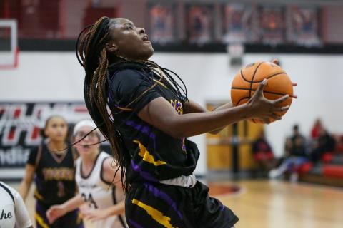 Columbia guard Eriel Baker rises for a layup Friday night against Fort White. (BRENT KUYKENDALL/Lake City Reporter)