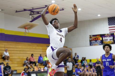 Columbia forward Ty'jahn Wright goes up for a dunk against Clay on Dec. 7. (BRENT KUYKENDALL/Lake City Reporter)