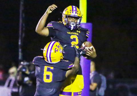 Columbia running back Tony Fulton (2) celebrates with receiver Tray Tolliver (6) after scoring a touchdown against Choctawhatchee in the Region 1-3S final last Friday. (BRENT KUYKENDALL/Lake City Reporter)