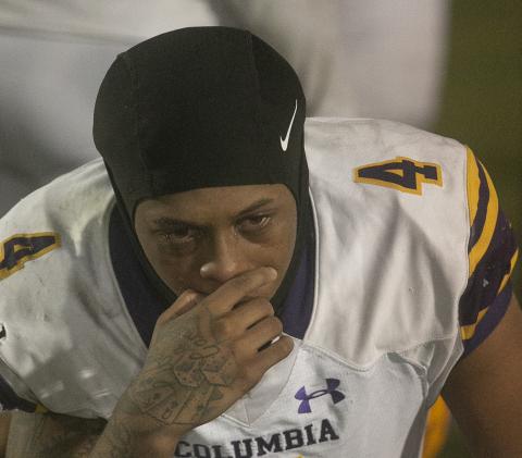 Columbia senior Dailyn Bradley sheds tears after the Tigers lost to Lake Wales at Legion Field on Friday night in a Class 3S state semifinal. (MICHAEL WILSON/Special to the Reporter)
