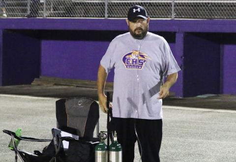 Columbia head coach Chip Garner stands on the sideline with his oxygen tank during Tuesday’s game against Hamilton County. (MORGAN MCMULLEN/Lake City Reporter)