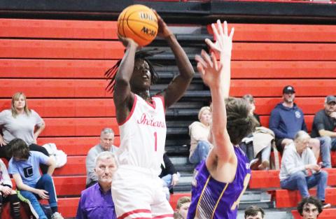 Fort White guard Najeeb Smith shoots against Bell on Thursday night. (JORDAN KROEGER/Lake City Reporter)