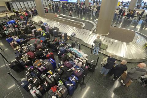 Baggage waits to be claimed at the Southwest Airlines baggage claim Tuesday at Salt Lake City International Airport. (RICK BOWMER/Associated Press)