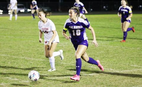 Columbia midfielder Skyler Ziegaus pushes the ball up the field against Keystone Heights on Monday night. (JORDAN KROEGER/Lake City Reporter)