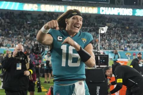 Jacksonville Jaguars quarterback Trevor Lawrence celebrates after defeating the Tennessee Titans on Saturday in Jacksonville. The Jaguars won 20-16. (JOHN RAOUX/Associated Press)
