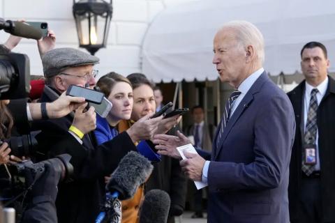 President Joe Biden talks with reporters before he and first lady Jill Biden board Marine One on the South Lawn of the White House on Wednesday. (SUSAN WALSH/Associated Press)
