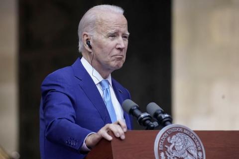 President Joe Biden listens during a news conference with Mexican President Andres Manuel Lopez Obrador and Canadian Prime Minister Justin Trudeau at the North American Leaders’ Summit at the National Palace in Mexico City Tuesday. (ANDREW HARNIK/Associated Press)