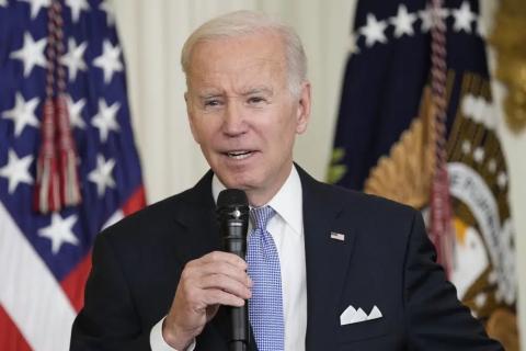 President Joe Biden speaks in the East Room of the White House to mayors who are attending the U.S. Conference of Mayors winter meeting on Jan. 20 in Washington. (SUSAN WALSH/Associated Press)