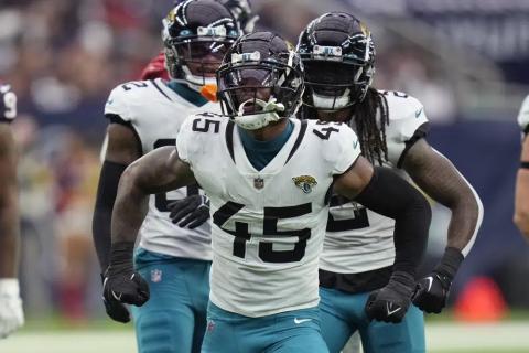 Jacksonville Jaguars linebacker K'Lavon Chaisson celebrates a play against the Houston Texans during Sunday's game in Houston. (ERIC CHRISTIAN SMITH/Associated Press)