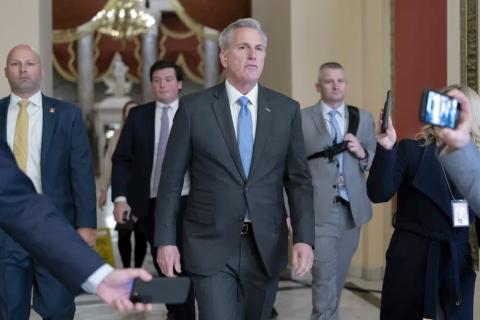 Speaker of the House Kevin McCarthy, R-Calif., talks to reporters as he walks to the speaker's ceremonial office at the Capitol in Washington on Monday. (JOSE LUIS MAGANA/Associated Press)
