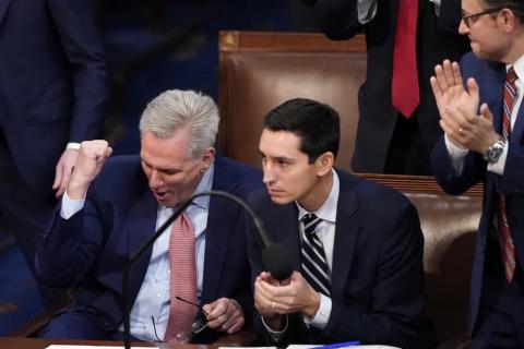 Rep. Kevin McCarthy (left) reacts after being nominated for the third round of votes for Speaker of the House on the opening day of the 118th Congress at the U.S. Capitol on Tuesday in Washington. (ALEX BRANDON/Associated Press)