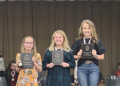 Whitney Mosley (right) won the Lafayette County 4-H Florida Power and Light Speech Contest. Placing second was Bristol Land (center) with Lane Colson (left) finishing third. (COURTESY)