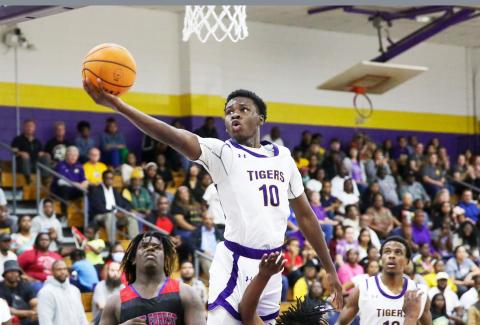Columbia guard Isaac Broxey gets to the rim for a layup against Pine Forest during the Region 1-5A quarterfinals last Thursday. (BRENT KUYKENDALL/Lake City Reporter)