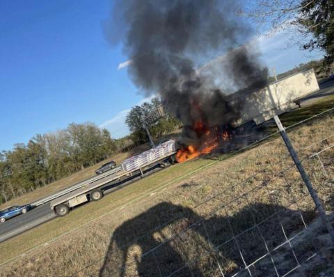 A semi truck’s cab caught on fire after hitting another truck on Interstate 75 on Sunday. (COURTESY SUWANNEE COUNTY FIRE RESCUE)