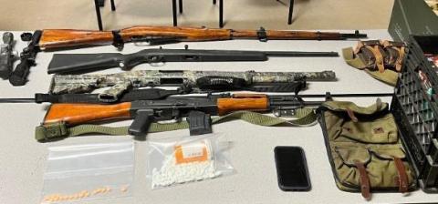 Multiple firearms and ammunition were found in a burglary suspect's vehicle Thursday. (COURTESY)