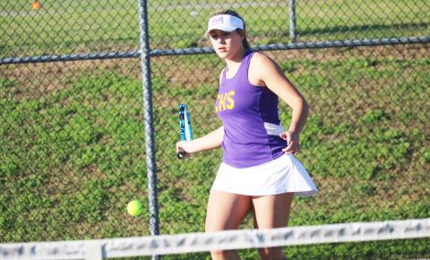Columbia’s Cassidy O’Neal returns a shot against Baker County on Tuesday. (JORDAN KROEGER/Lake City Reporter)