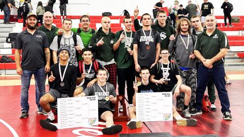 Suwannee’s wrestling team celebrates after winning the Region 1-1A IBT on Saturday. (COURTESY)