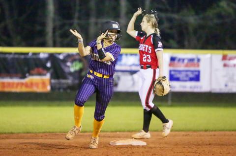 Columbia outfielder Luisa Taylor celebrates coming off second base after McKenna O’Sullivan hit a home run against Lafayette on Tuesday night. (BRENT KUYKENDALL/Lake City Reporter)