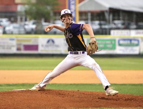 Columbia pitcher Bynton Edge winds up to pitch during Tuesday's game against Union County that was postponed due to rain. (BRENT KUYKENDALL/Lake City Reporter)