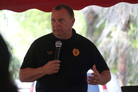 Lake City Police Chief Gerald Butler speaks Sunday at a rally against gun violence organized by the Gateway Ministerial Alliance. The rally occurred a few hours after and a couple blocks away from an incident where four people were injured by gunfire. (JAMIE WACHTER/Lake City Reporter)