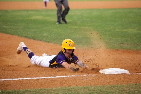Columbia designated hitter Matt Dumas slides safely into third base against Union County on Tuesday. Dumas scored via a throwing error on the play. (BRENT KUYKENDALL/Lake City Reporter)