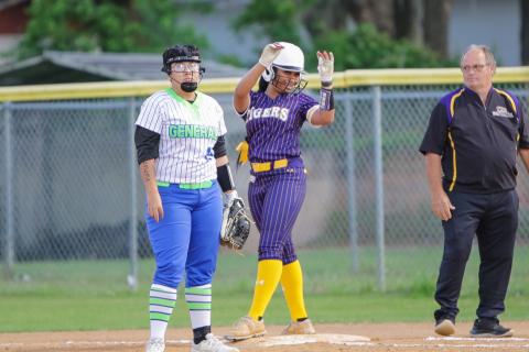 Columbia outfielder Karis Jernigan celebrates after reaching first base safely against Riverside on Thursday night. (BRENT KUYKENDALL/Lake City Reporter)