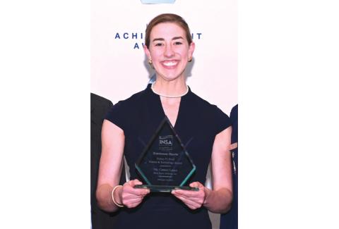 Fort White High School alumnus Cameo Lance displays her award. (COURTESY)