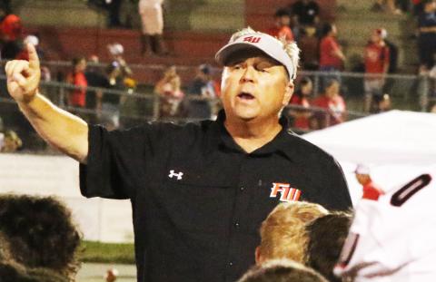 Former Fort White head coach Lee Dorsett addresses his team following a loss to Williston on Sept. 23, 2022. (MORGAN MCMULLEN/Lake City Reporter)