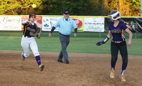 Columbia’s Luisa Taylor chases after Bell’s Dacy Graham in a rundown during Wednesday night’s game. (MORGAN MCMULLEN/Lake City Reporter)