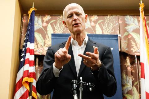 U.S. Sen. Rick Scott speaks to reporters during a round table discussion at the Sun Towers Retirement Community on Feb. 10 in Sun City Center. (Jefferee Woo/Tampa Bay Times/TNS)