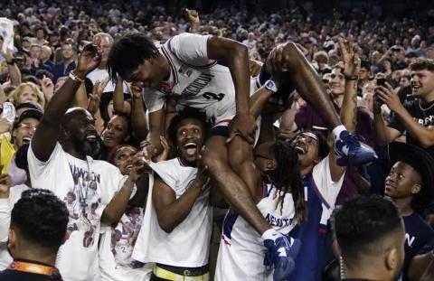 Connecticut guard Tristen Newton celebrates after their win against San Diego State in the national championship game on Monday in Houston. (BRYNN ANDERSON/Associated Press)