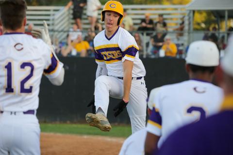 Columbia third baseman Ayden Phillips celebrates after hitting a two-run home run against Buchholz on Tuesday night. (BRENT KUYKENDALL/Lake City Reporter)