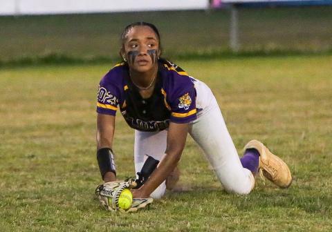 Columbia left fielder Sakiya Merriex looks up after making a diving catch against Williston on Thursday night. (BRENT KUYKENDALL/Lake City Reporter)