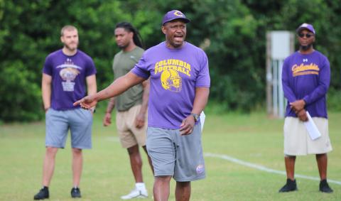 Columbia coach Brian Allen instructs his team during its first spring practice on Monday. (JORDAN KROEGER/Lake City Reporter)