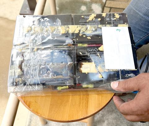 The leaking battery backup that forced the Columbia County Tax Collectors office to close early Thursday. (COURTESY)