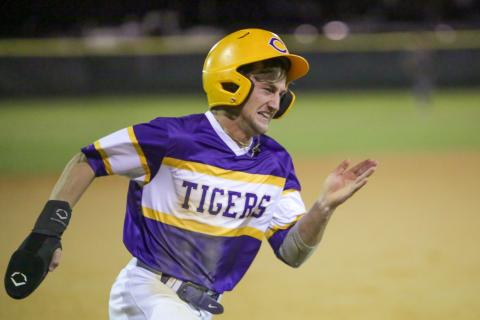 Columbia’s Matt Dumas strains as he rounds third base during Wednesday’s 8-5 loss to Chiles. (BRENT KUYKENDALL/Special to the Reporter)