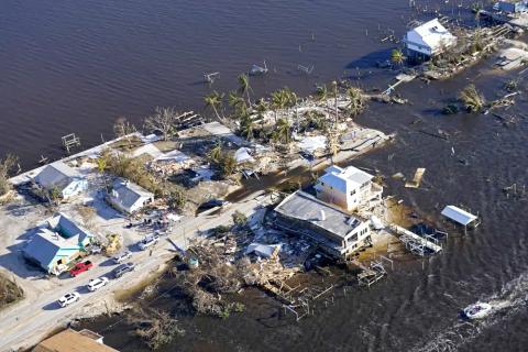 The bridge leading from Fort Myers to Pine Island is seen heavily damaged in the aftermath of Hurricane Ian on Pine Island on Oct. 1. (GERALD HERBERT/AP File)