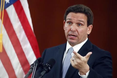 Florida Gov. Ron DeSantis answers questions from the media in the Florida Cabinet following his State of the State address during a joint session of the Senate and House of Representatives on March 7 at the state Capitol in Tallahassee. (AP FILE)