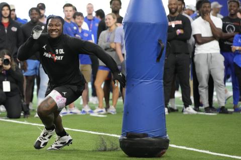 Florida defensive lineman Gervon Dexter Sr. performs a drill during his Pro Day on March 30 in Gainesville. (JOHN RAOUX/Associated Press)