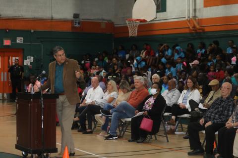 Columbia County Sheriff Mark Hunter (standing) addresses the joint city-county meeting on Tuesday. (TONY BRITT/Lake City Reporter)