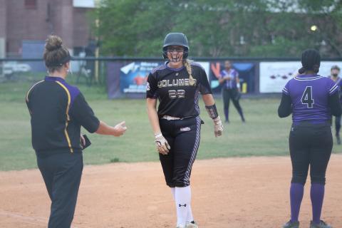 Columbia pitcher McKenna O’Sullivan celebrates on third after hitting an RBI double earlier in the first inning against Gainesville on Wednesday night. (JORDAN KROEGER/Lake City Reporter)