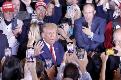 Former President Donald Trump arrives at an event at Mar-a-Lago on Tuesday in West Palm Beach after being arraigned on 34 felony counts earlier in the day. (ALEX WONG/Getty Images/TNS)