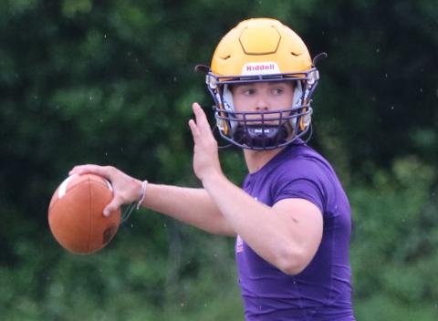 Columbia quarterback Evan Umstead drop backs to pass during Monday’s practice. (JORDAN KROEGER/Lake City Reporter)