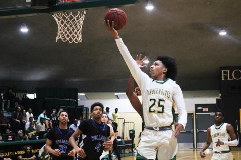 FGC guard Antewan Webber rises for a layup against Pitt CC in the South Atlantic District B championship on March 11. (JORDAN KROEGER/Lake City Reporter)